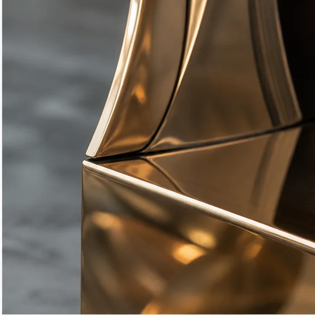 Polished brass sculptural finish detail