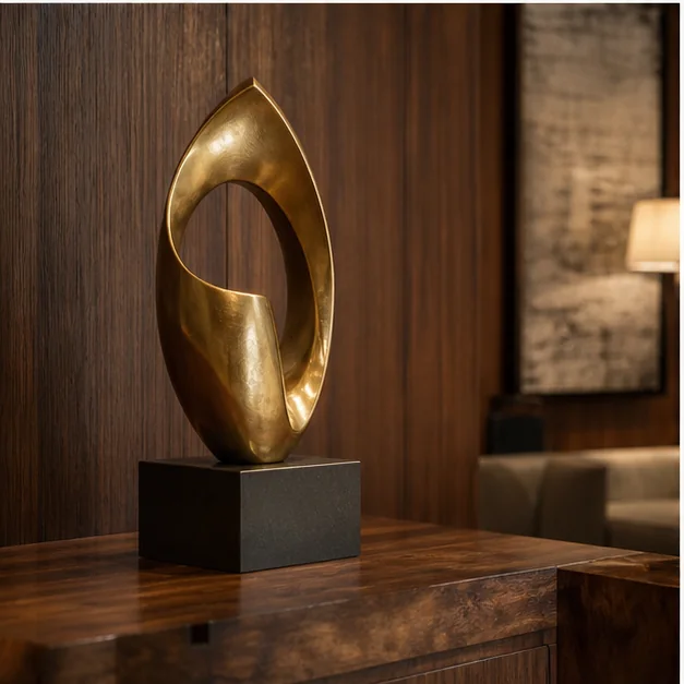 Brass sculpture detail paired with premium wood finishes
