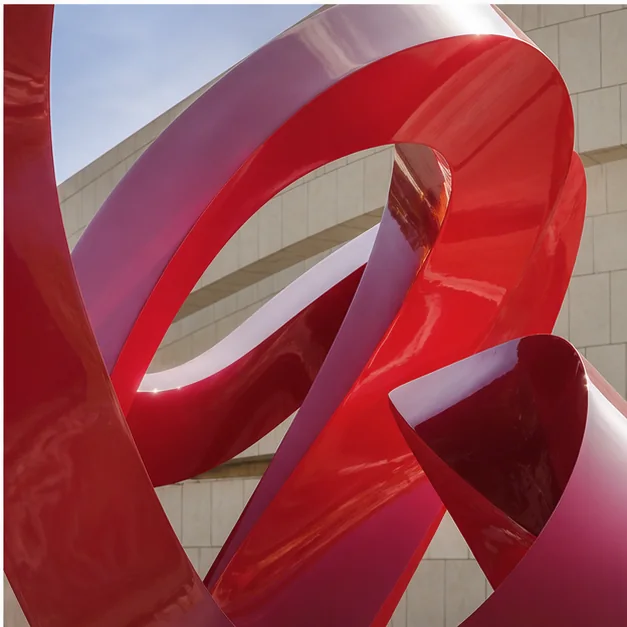 Dramatic oversized fiberglass sculpture detail for the final call to action