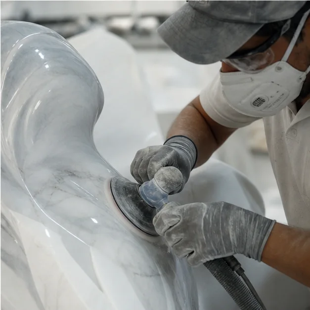 Dramatic close-up of carved marble for the final call to action