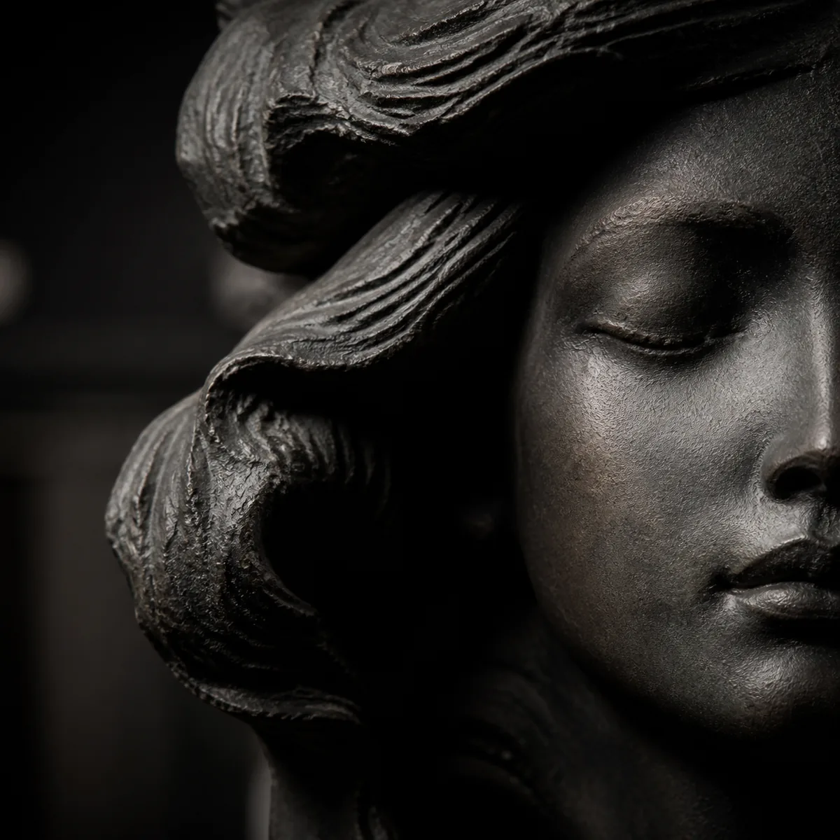 Monochrome close-up of a sculptural artwork detail