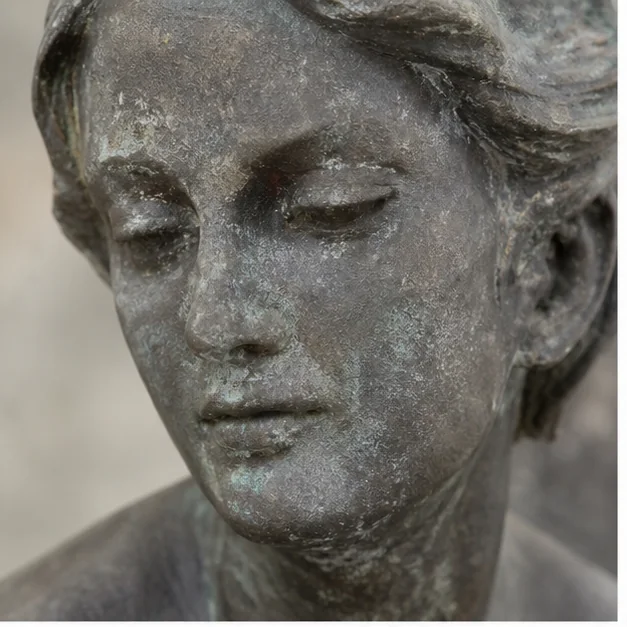 Weathered and affected sculpture surface before maintenance