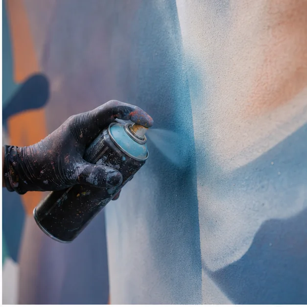 Spray detail from a professional street-art mural