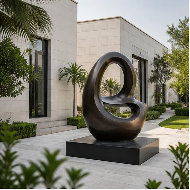 Contemporary outdoor sculpture integrated into a Dubai villa garden